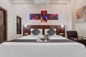 Townhouse Hotel O Benchmark客房内的一张或多张床位