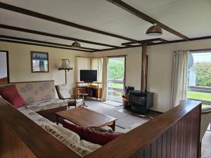 TV a/nebo společenská místnost v ubytování Holiday Haven