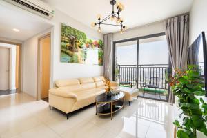 Posezení v ubytování Olala Saigon Apartment in Rivergate Building