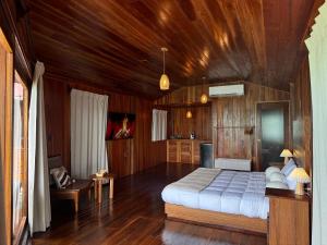 Postel nebo postele na pokoji v ubytování Hotel Cabañas María Isabel, Bacalar