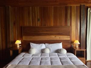 Postel nebo postele na pokoji v ubytování Hotel Cabañas María Isabel, Bacalar