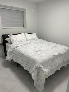 Postel nebo postele na pokoji v ubytování Bird Nest Suites