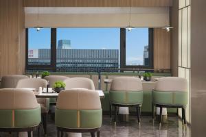 Zona d'estar a 义乌君忆云澜国际酒店 Yiwu Junyi Yunlan International Hotel