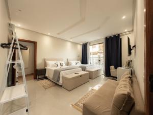 Giường trong phòng chung tại Diamantina Falls Boutique Hotel & Spa +144 ảnh