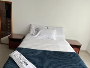 Ένα ή περισσότερα κρεβάτια σε δωμάτιο στο Hotel Villa María Coworking