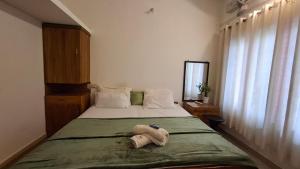Postel nebo postele na pokoji v ubytování Purayilhomestay