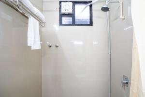 Afbeelding uit fotogalerij van Cross Roads Inn in Coimbatore