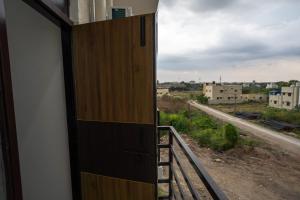 Afbeelding uit fotogalerij van Cross Roads Inn in Coimbatore