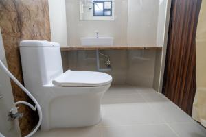 Afbeelding uit fotogalerij van Cross Roads Inn in Coimbatore