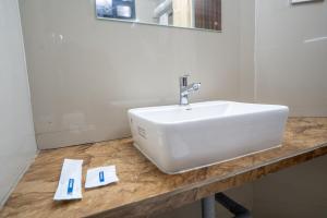 Afbeelding uit fotogalerij van Cross Roads Inn in Coimbatore +15 foto's