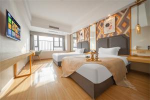 Gulta vai gultas numurā naktsmītnē Kuanyue Service Apartment Chongqing Lijia Children's Hospital Happy Valley Branch