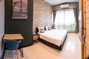 Ένα ή περισσότερα κρεβάτια σε δωμάτιο στο Penny - Farthing Pool Villa +80 φωτογραφίες