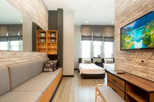 Μια τηλεόραση ή/και κέντρο ψυχαγωγίας στο Penny - Farthing Pool Villa