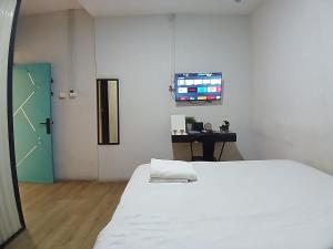 Televiisor ja/või meelelahutuskeskus majutusasutuses PINX'S HOSTEL