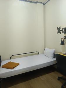 Voodi või voodid majutusasutuse PINX'S HOSTEL toas