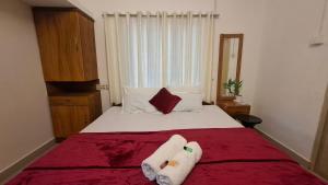 Postel nebo postele na pokoji v ubytování Purayilhomestay