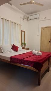 Postel nebo postele na pokoji v ubytování Purayilhomestay