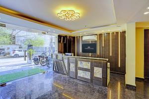 TV a/nebo společenská místnost v ubytování Hotel Krone Plaza Near IGI Airport Delhi + 20 fotografií