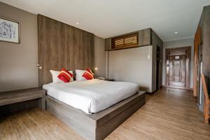 Postel nebo postele na pokoji v ubytování Naiya Buree Boutique Resort