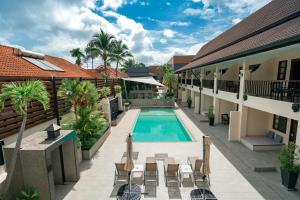 Bazén v ubytování Naiya Buree Boutique Resort nebo v jeho okolí