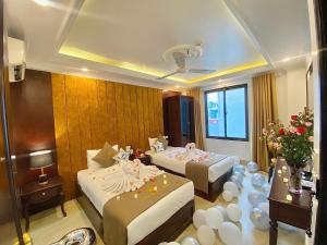 En eller flere senge i et værelse på Nam Cường X Hotel + 50 billeder