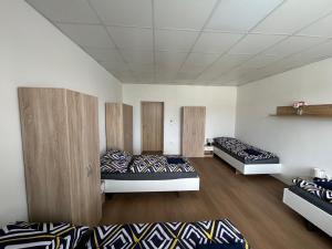 Posteľ alebo postele v izbe v ubytovaní Skodova 4 Apartments