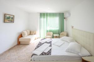 Postel nebo postele na pokoji v ubytování COMPLEX TISMANA 3* ALL INCLUSIVE + 37 fotografií