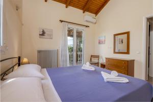 Ένα ή περισσότερα κρεβάτια σε δωμάτιο στο Margaritas Villas
