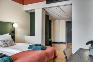 Voodi või voodid majutusasutuse Hotel Fratelli toas