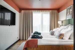 Voodi või voodid majutusasutuse Hotel Fratelli toas