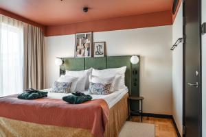 Voodi või voodid majutusasutuse Hotel Fratelli toas