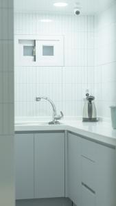 Η κουζίνα ή μικρή κουζίνα στο Pocket Seoul Branch 2 +88 φωτογραφίες