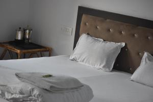 Kedar-Kashi Resorts and Resturant客房内的一张或多张床位