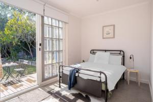Ένα ή περισσότερα κρεβάτια σε δωμάτιο στο Bayside Family Haven