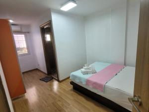 Postel nebo postele na pokoji v ubytování New koa condo hotel