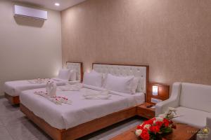 Voodi või voodid majutusasutuse Savitri Resort toas