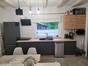 Kuchnia lub aneks kuchenny w obiekcie Apartament Zacisze