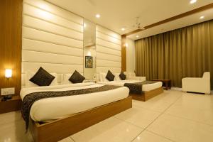 Voodi või voodid majutusasutuse Savitri Resort toas
