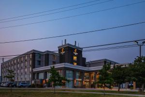 a building with a clock tower on top of it at Comfort Inn & Conference Centre Toronto Airport in Toronto