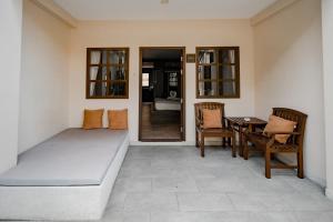 Postel nebo postele na pokoji v ubytování Naiya Buree Boutique Resort