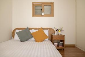 Кровать или кровати в номере 오직 한팀만 사용하는 서울 전통 한옥 JNPstay