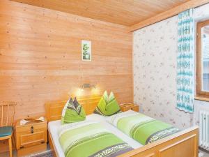 Łóżko lub łóżka w pokoju w obiekcie Spacious Apartment near Ski Area in Mittersill