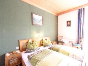 Łóżko lub łóżka w pokoju w obiekcie Spacious Apartment near Ski Area in Mittersill