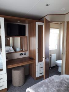 Ένα ή περισσότερα κρεβάτια σε δωμάτιο στο Beautiful caravan Haven wild duck belton norfolk