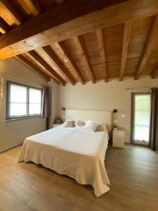 Postel nebo postele na pokoji v ubytování Agriturismo Cascina Carai