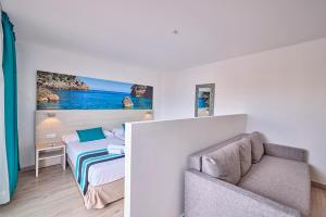 Postel nebo postele na pokoji v ubytování Welikehotel Fenix