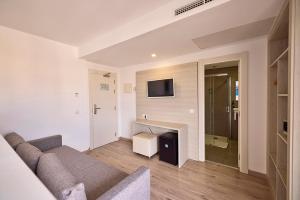 TV a/nebo společenská místnost v ubytování Welikehotel Fenix