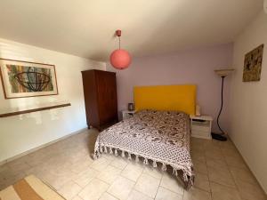Postel nebo postele na pokoji v ubytování Casa in campagna a Rosciano