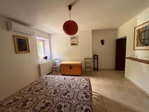 Postel nebo postele na pokoji v ubytování Casa in campagna a Rosciano