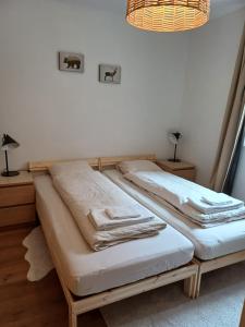 Posteľ alebo postele v izbe v ubytovaní Spacieux appart - 2 chambres à coucher incl Jacuzzi Privé